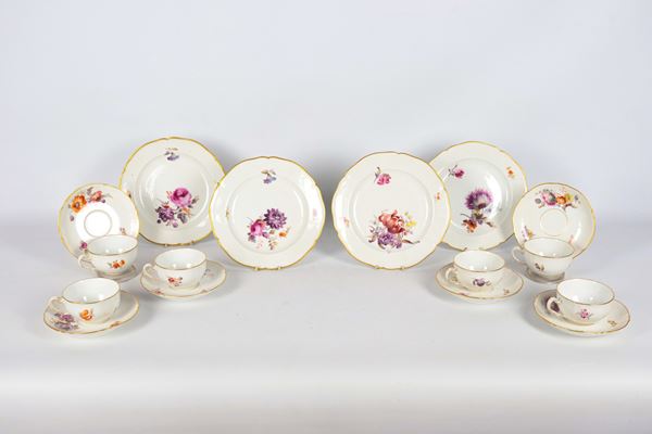 Antique Berlin KPM porcelain lot of four dessert plates and six cups with saucers, with polychrome decorations with flower bouquet motifs and pure gold edges (10 pcs). Late 19th century