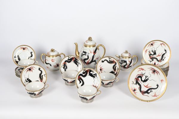 Japanese tea set in white porcelain with dragon decorations: teapot, milk jug, sugar bowl, five cups with saucers, dessert plate and eleven dessert plates (20 pcs.)