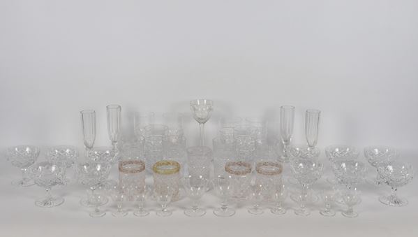 Lot of forty-two crystal glasses of various shapes and sizes, some chipped