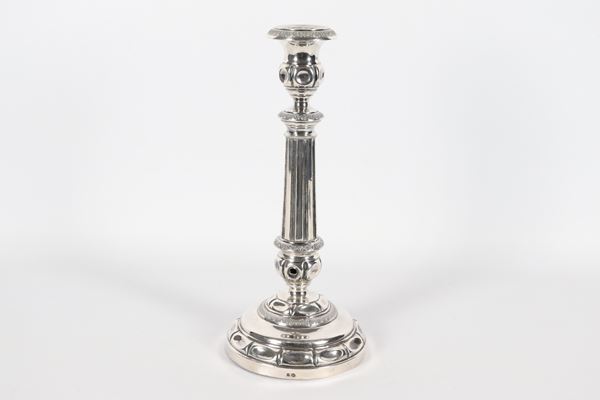 Antique silver candlestick, chiseled and embossed with Empire motifs. French stamps, gr. 230