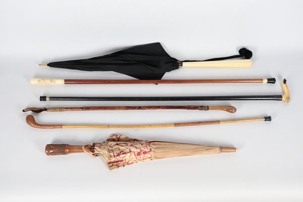 Lot of three walking sticks, a whip and two umbrellas. 1920s-1940s, defects (6 pcs.)