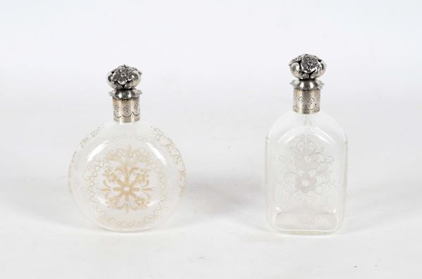 Lot of two antique Liberty perfume bottles, in engraved glass with silver necks and caps