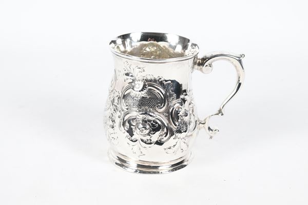 Antique silver mug, chiseled and embossed with floral scroll motifs, 280g