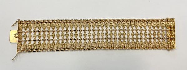 Bracciale in oro giallo 18kt a maglie snodabili con chiusura a scomparsa, gr. 51,5