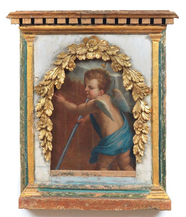 Scuola Romana Inizio XVIII Secolo - &quot;Cupid&quot;, small oil painting on canvas, in a gilded and lacquered wooden temple frame with a floral garland in relief