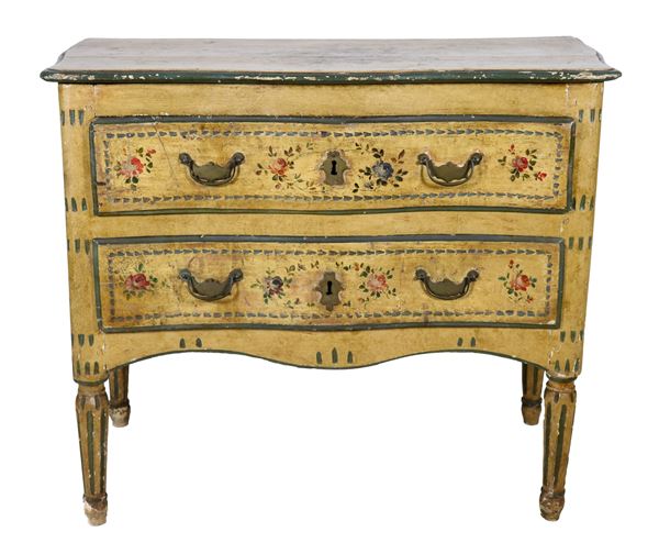 Antique Louis XVI style Marche chest of drawers in ivory lacquered wood, with painted floral motif decorations, two drawers and four conical legs. Some defects and one leg has been restored