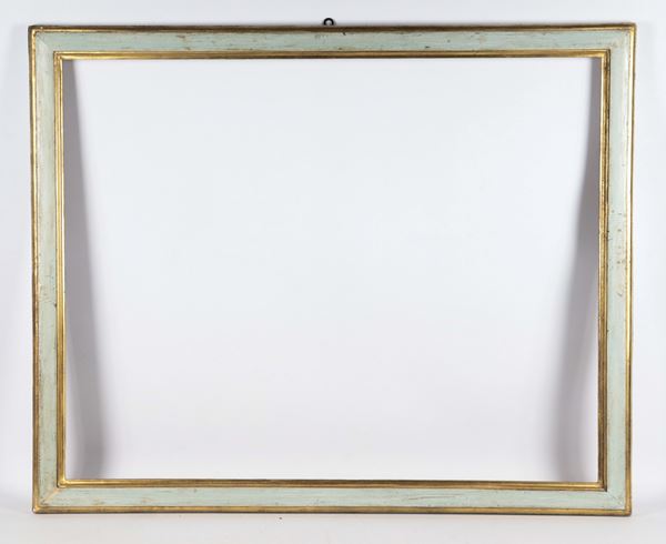 Antique blue lacquered wooden frame with golden profiles