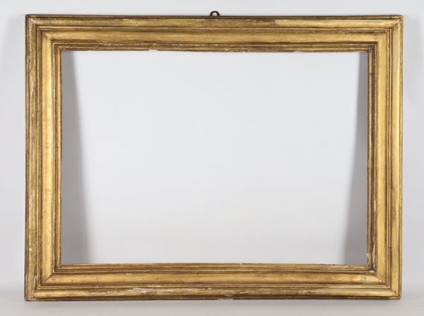 Antique gilded and carved wooden frame